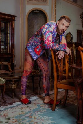 Colorful See-Through Tattoo Meggings And Tattoo Biker Jacket Ensemble (Photo: Tom Hooliganov)